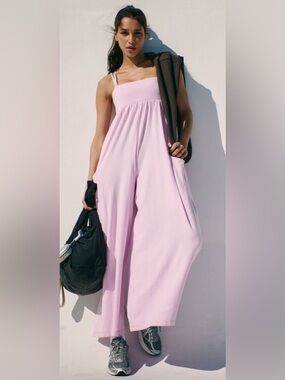 FREE PEOPLE HOT SHOT STRAPPy JUMPSUIT IN PINK
NEW WITH TAGS 
SIZE S AVAILABLE